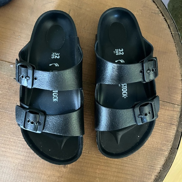 Birkenstock Black Sandals with Adjustable Straps and Contoured Footbed - Picture 1 of 4